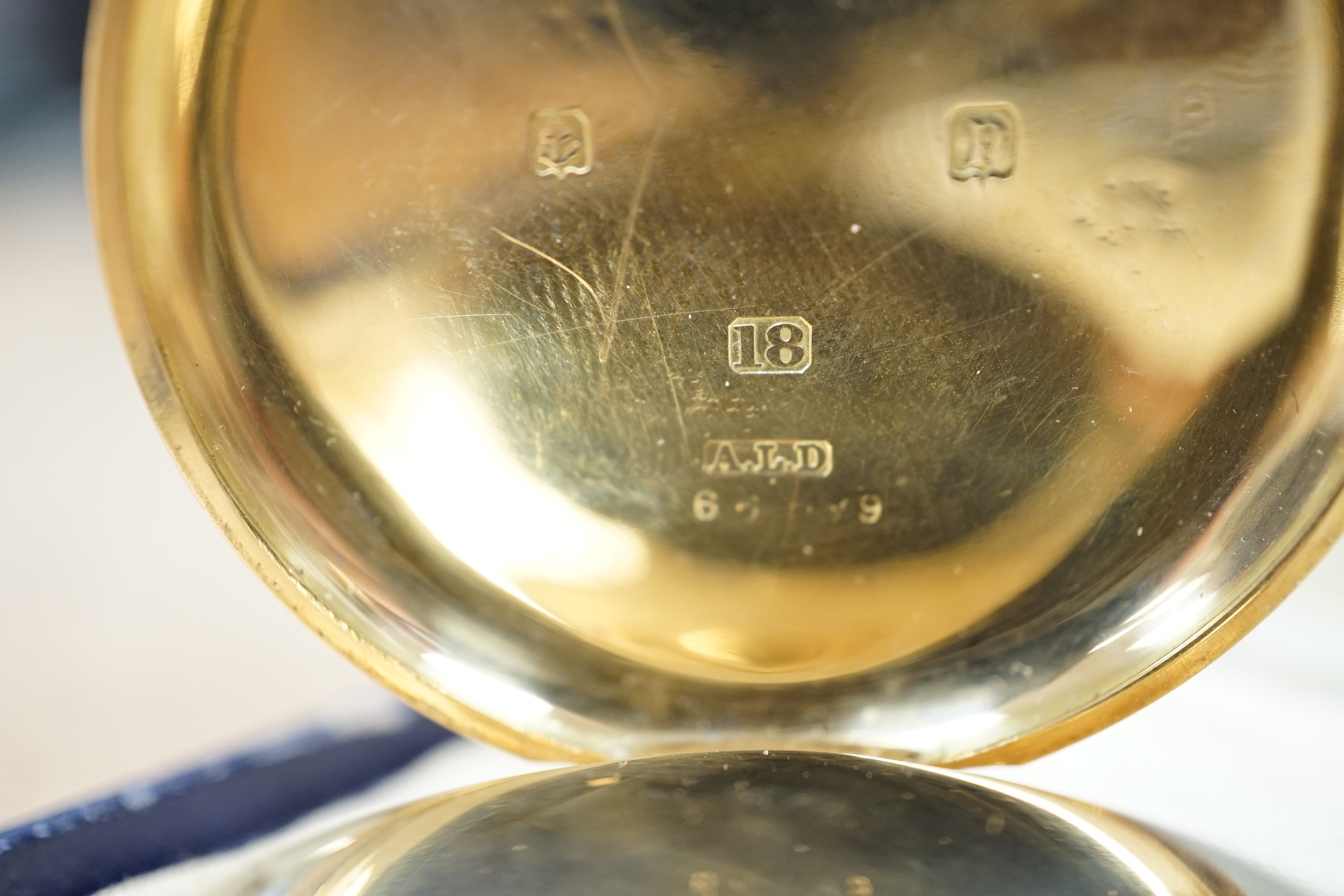 A George V 18ct gold Waltham open faced keyless pocket watch, with Arabic dial and subsidiary seconds, case diameter 50mm, gross weight 98.9 grams.